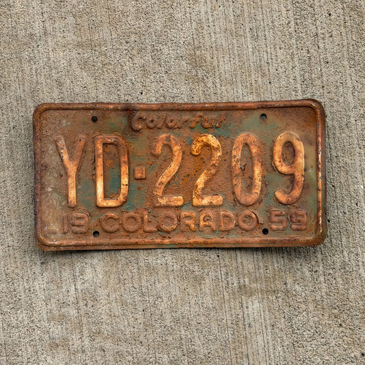 Photo of a 1959 Colorado License Plate Auto Tag Garage Decor Vintage YD 2209 with original patina