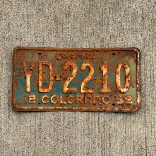 Photo of a 1959 Colorado License Plate Auto Tag Garage Decor Vintage YD 2210 with original patina