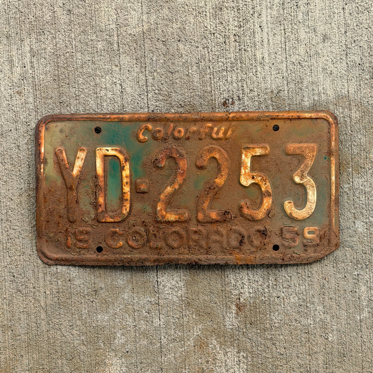 Photo of a 1959 Colorado License Plate Auto Tag Garage Decor Vintage YD 2253 with original patina
