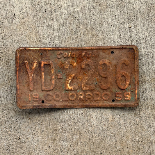 Photo of a 1959 Colorado License Plate Auto Tag Garage Decor Vintage YD 2296 with original patina