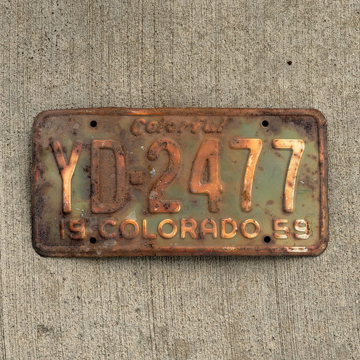 Photo of a 1959 Colorado License Plate Auto Tag Garage Decor Vintage YD 2477 with original patina