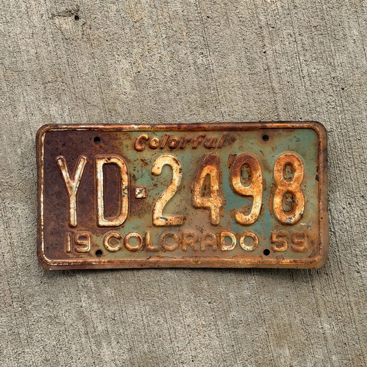 Photo of a 1959 Colorado License Plate Auto Tag Garage Decor Vintage YD 2498 with original patina