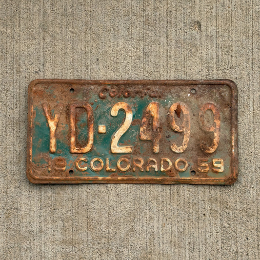 Photo of a 1959 Colorado License Plate Auto Tag Garage Decor Vintage YD 2499 with original patina