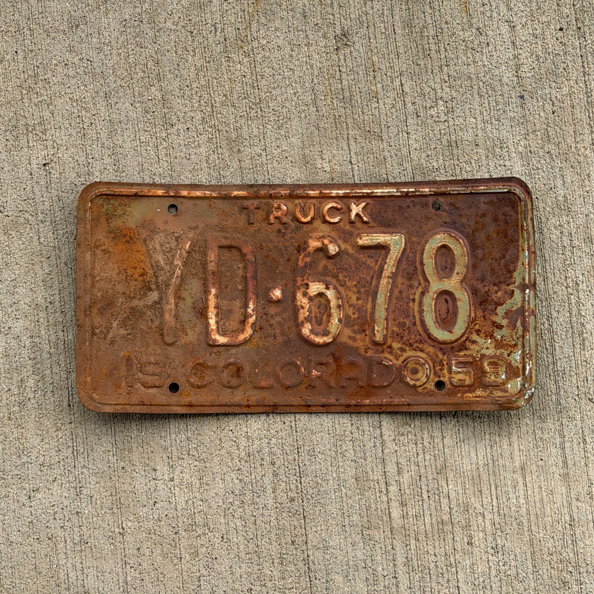 Photo of a 1959 Colorado Truck License Plate Auto Tag Garage Decor Vintage YD 678 with original patina