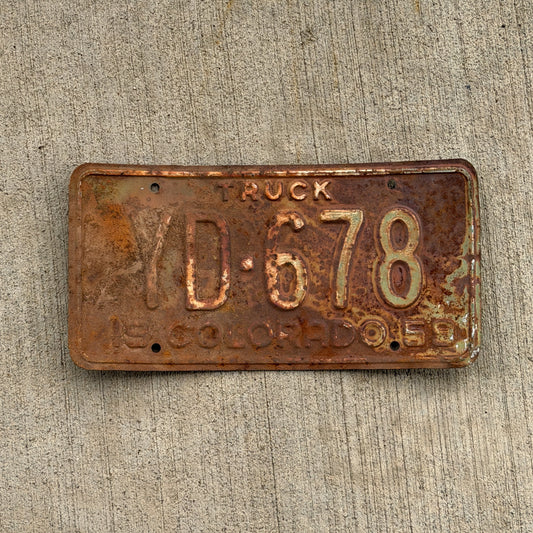 Photo of a 1959 Colorado Truck License Plate Auto Tag Garage Decor Vintage YD 678 with original patina