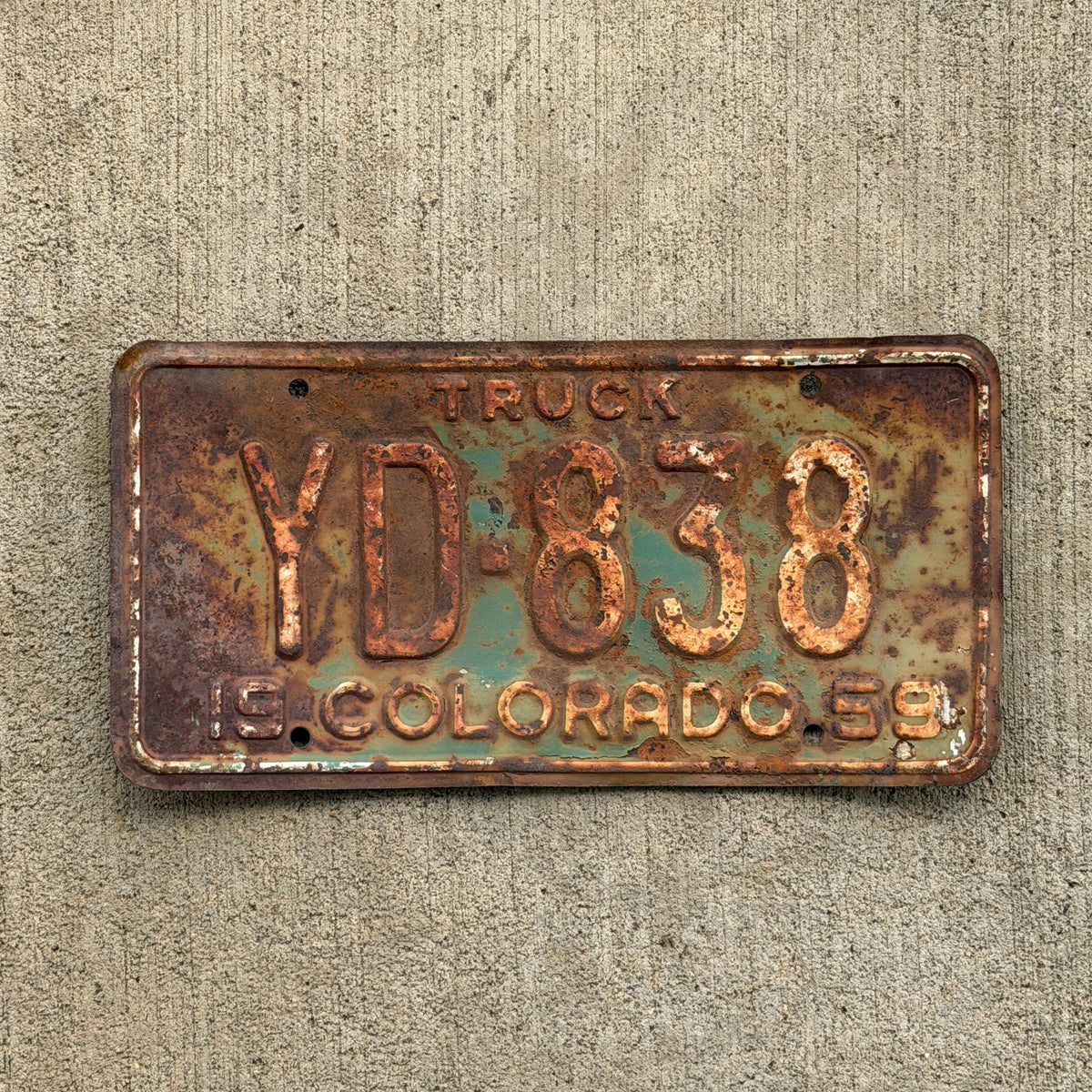 Photo of a 1959 Colorado Truck License Plate Auto Tag Garage Decor Vintage YD 838 with original patina