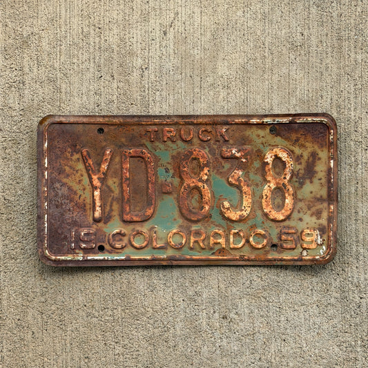 Photo of a 1959 Colorado Truck License Plate Auto Tag Garage Decor Vintage YD 838 with original patina