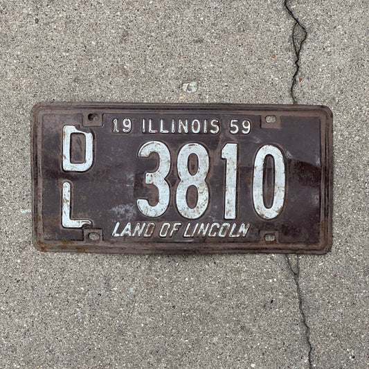 Photo of a 1959 Illinois Dealer License Plate Auto Tag Garage Decor Vintage 3810 with original patina