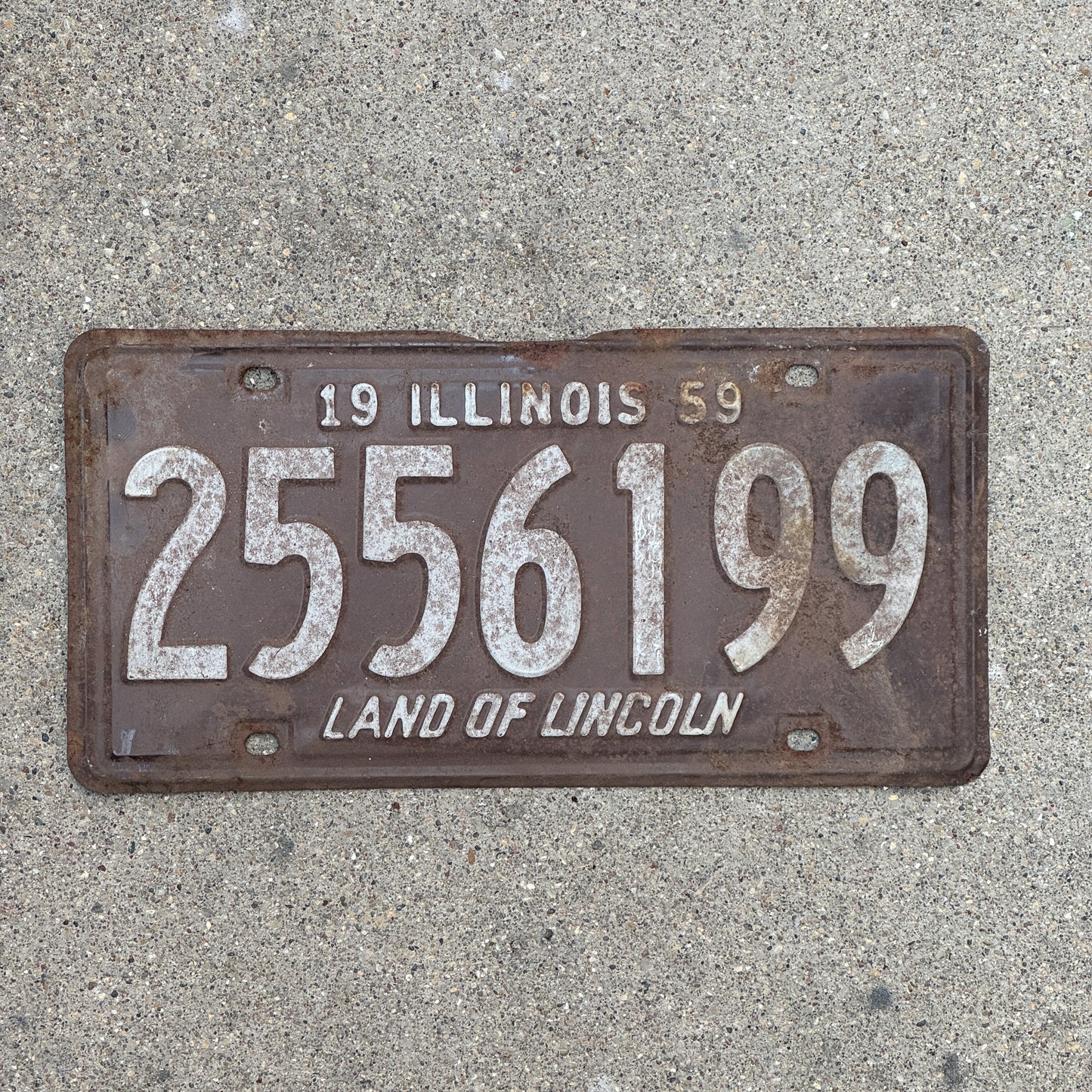 Photo of a 1959 Illinois License Plate Auto Tag 1 Vintage Garage 2 556 199 with original patina