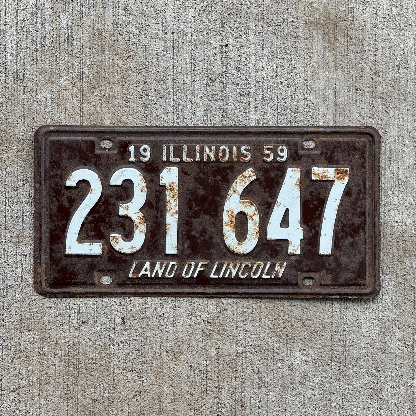 Photo of a 1959 Illinois License Plate Auto Tag 1 Vintage Garage 231 647 with original patina