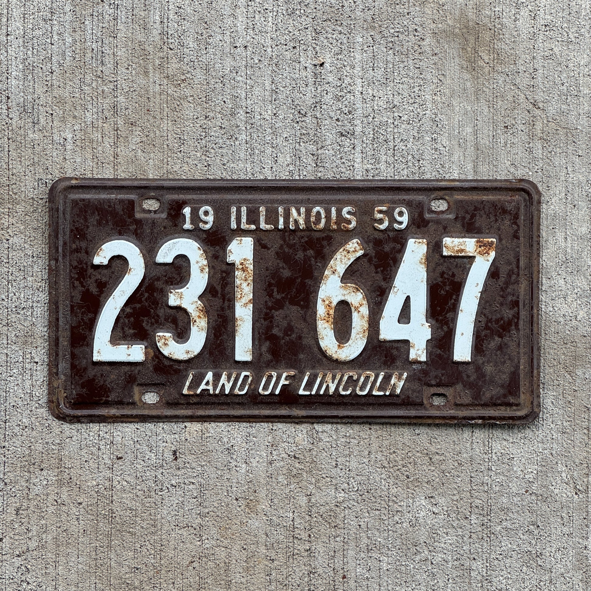 Photo of a 1959 Illinois License Plate Auto Tag 1 Vintage Garage 231 647 with original patina