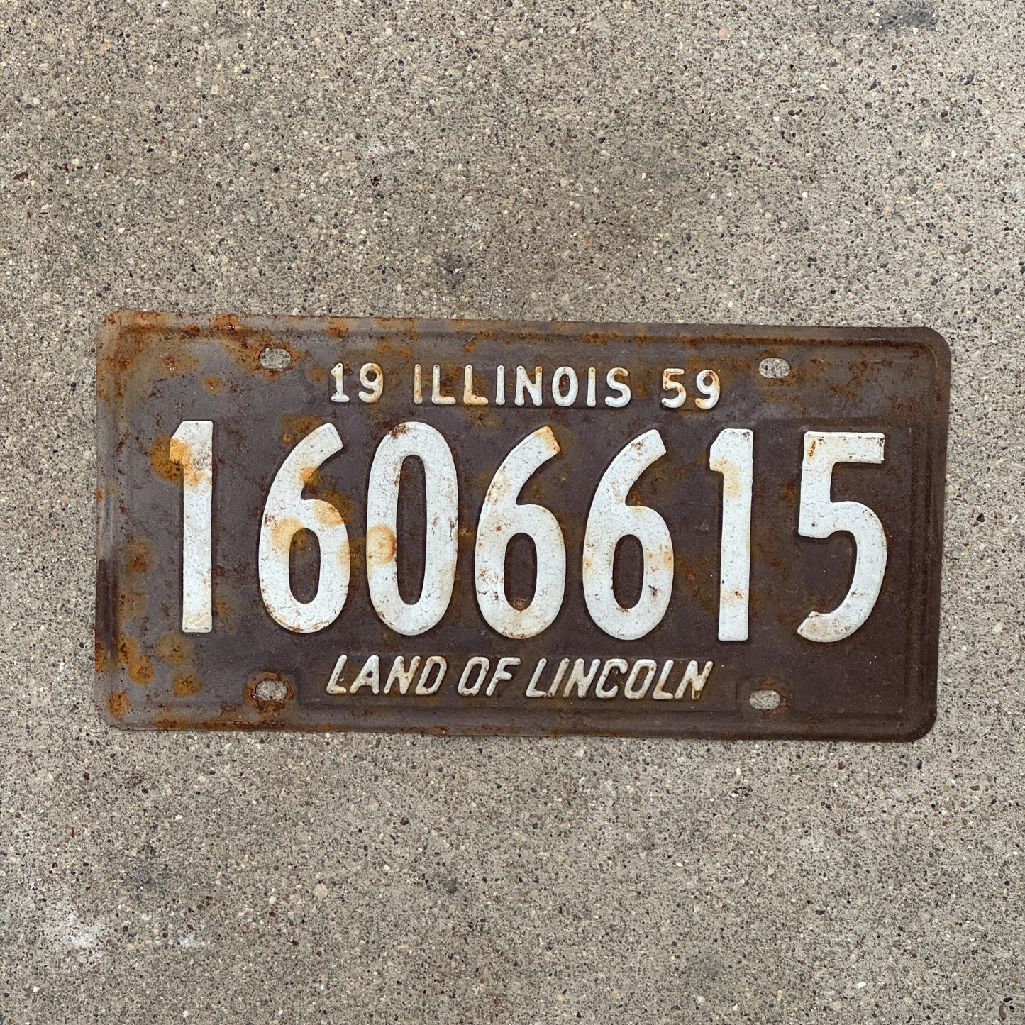 Photo of a 1959 Illinois License Plate Auto Tag 2 Vintage Garage 1 606 615 with original patina