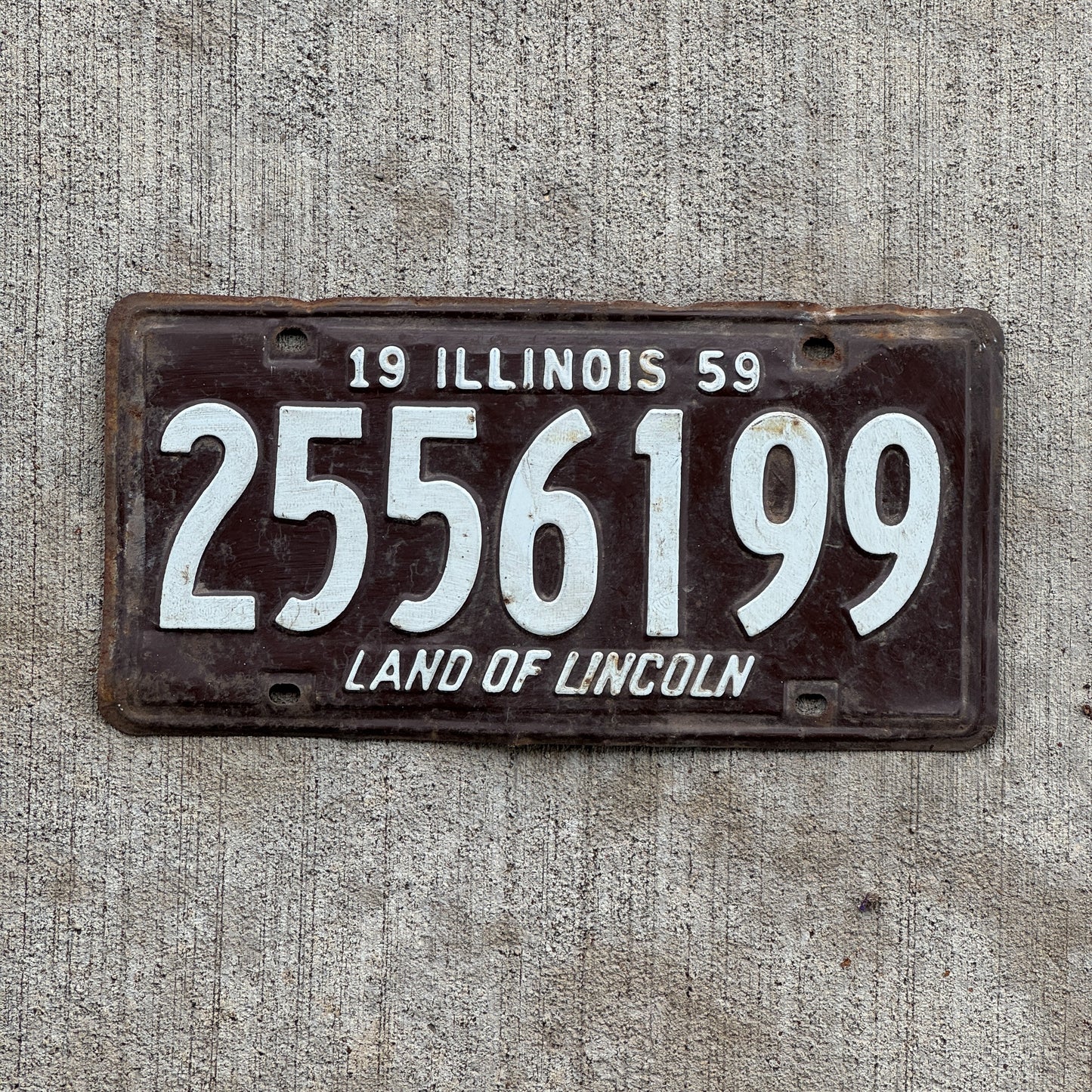 Photo of a 1959 Illinois License Plate Auto Tag 2 Vintage Garage 2 556 199 with original patina