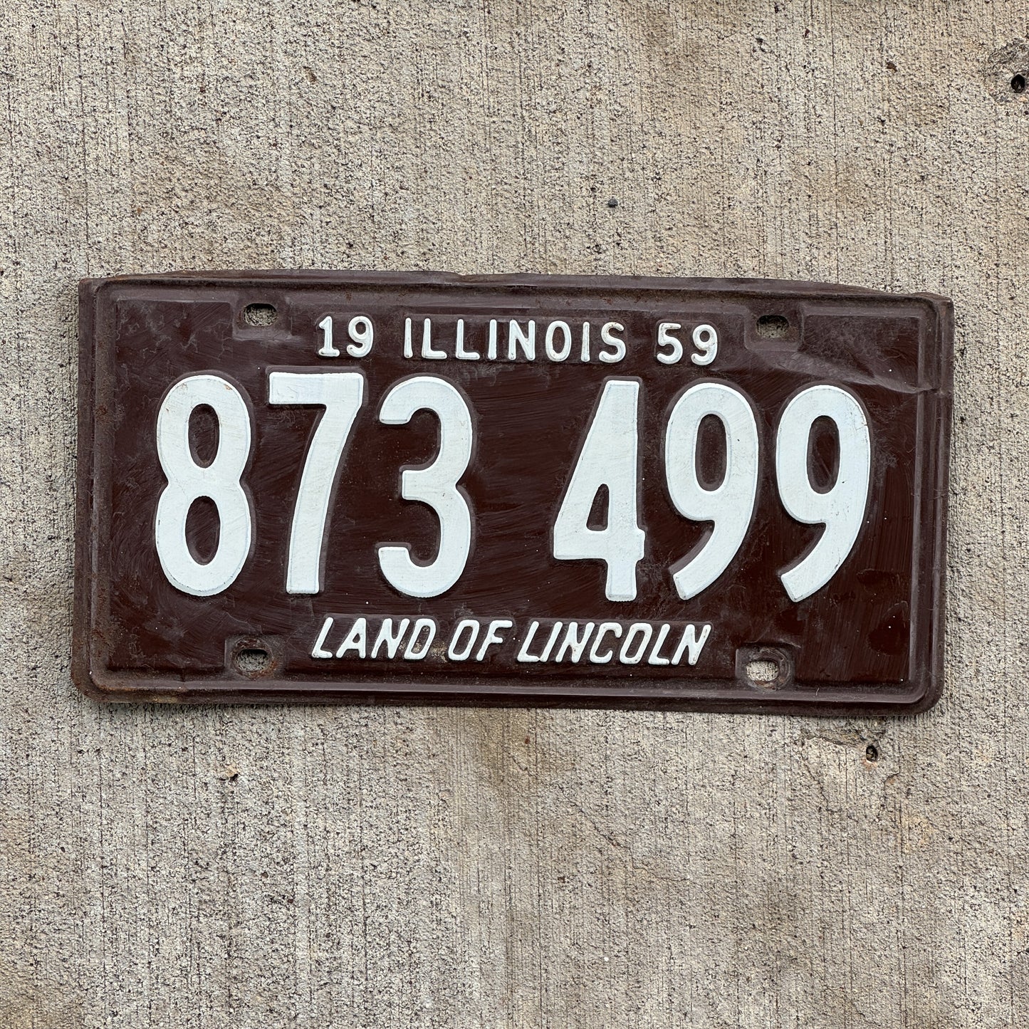 Photo of a 1959 Illinois License Plate Auto Tag 2 Vintage Garage 873 499 with original patina