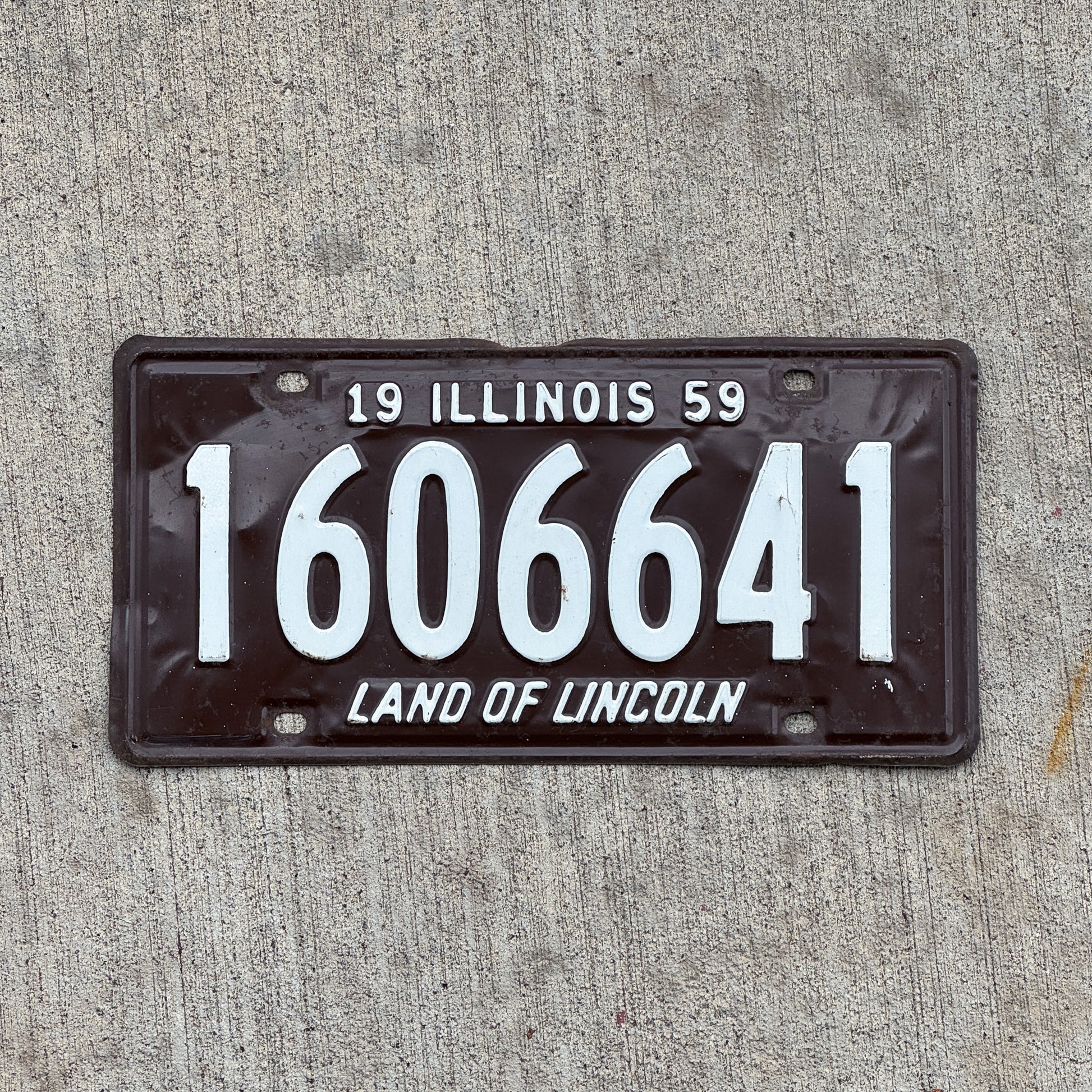 Photo of a 1959 Illinois License Plate Auto Tag Garage Decor Vintage 1 606 641 with original patina