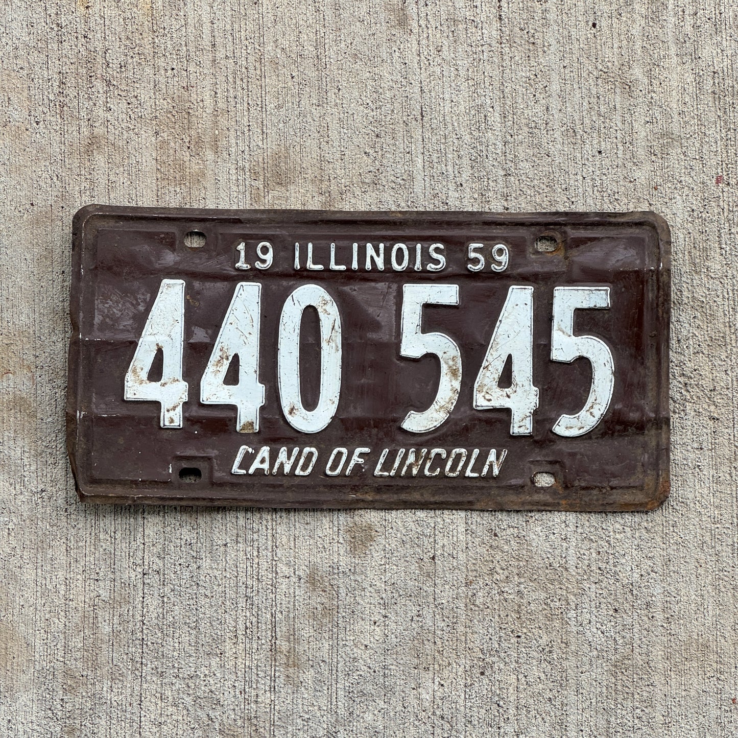 Photo of a 1959 Illinois License Plate Auto Tag Garage Decor Vintage 440 545 with original patina