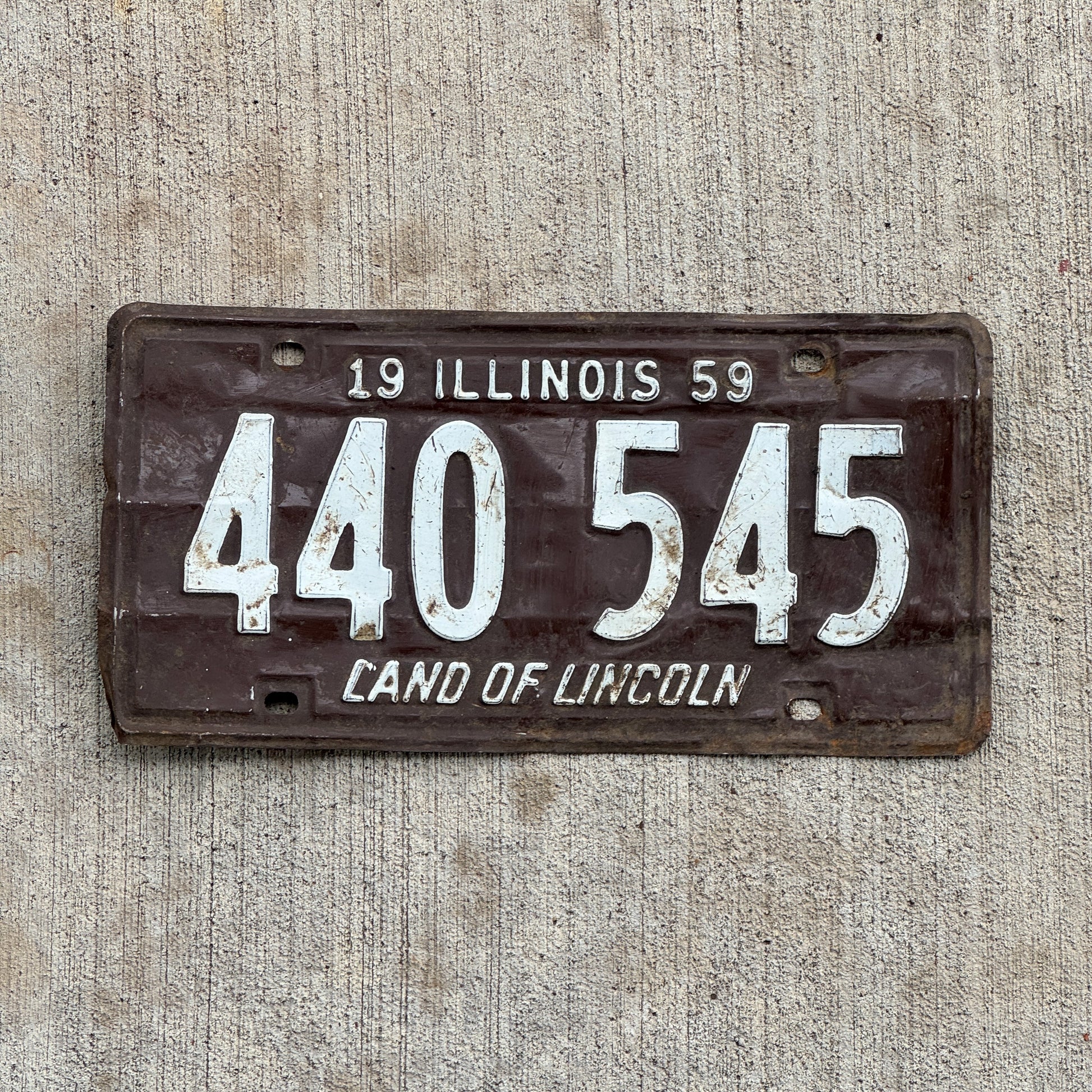 Photo of a 1959 Illinois License Plate Auto Tag Garage Decor Vintage 440 545 with original patina