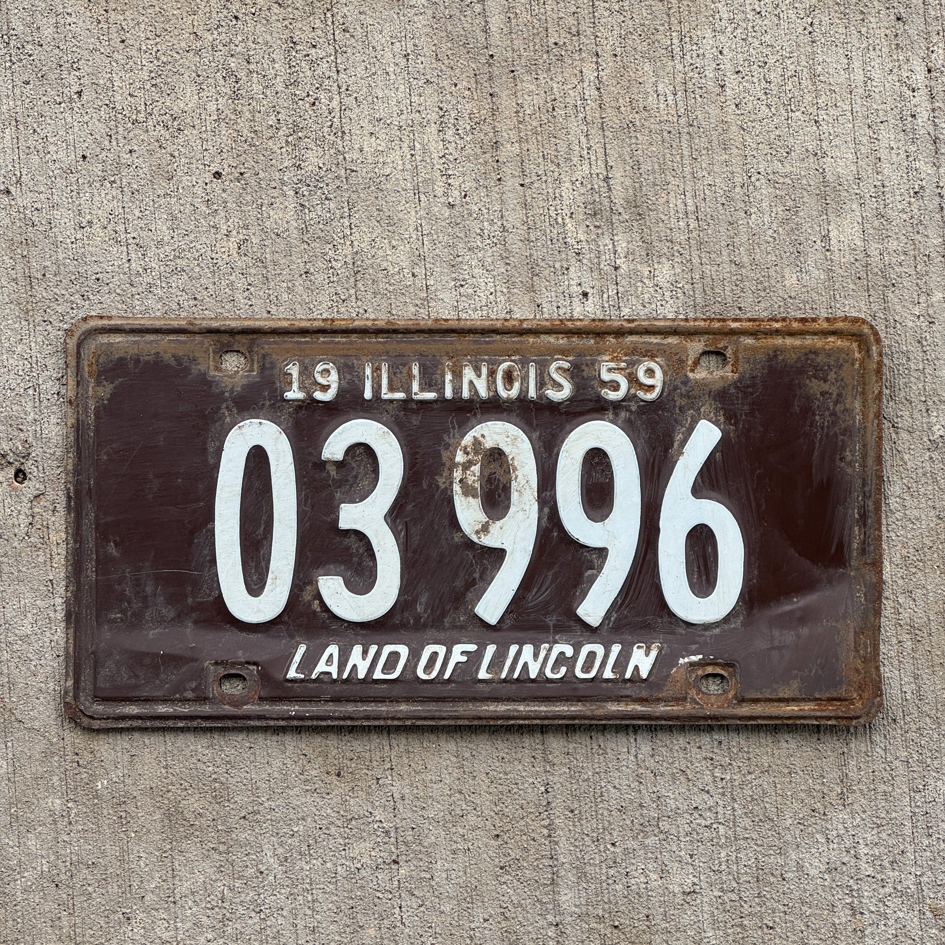 Photo of a 1959 Illinois Taxi License Plate Auto Tag 1 Vintage Garage 03 996 with original patina