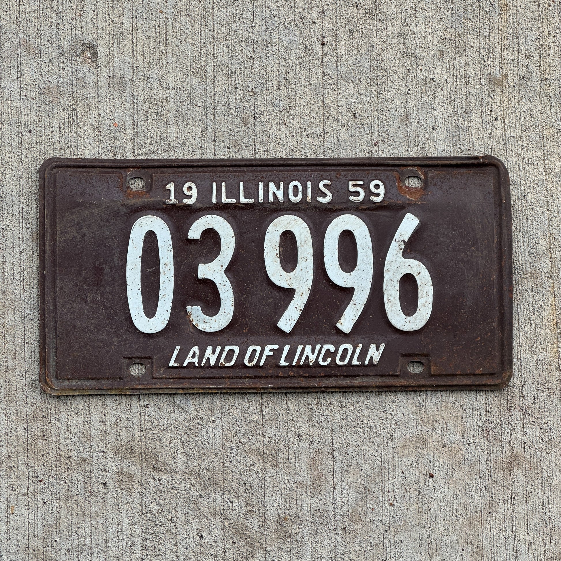 Photo of a 1959 Illinois Taxi License Plate Auto Tag 2 Vintage Garage 03 996 with original patina