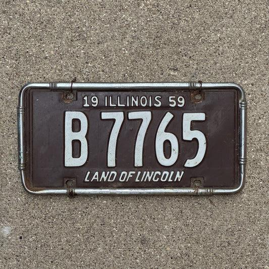 Photo of a 1959 Illinois Truck License Plate Auto Tag 1 Vintage Garage B 7765 with original patina