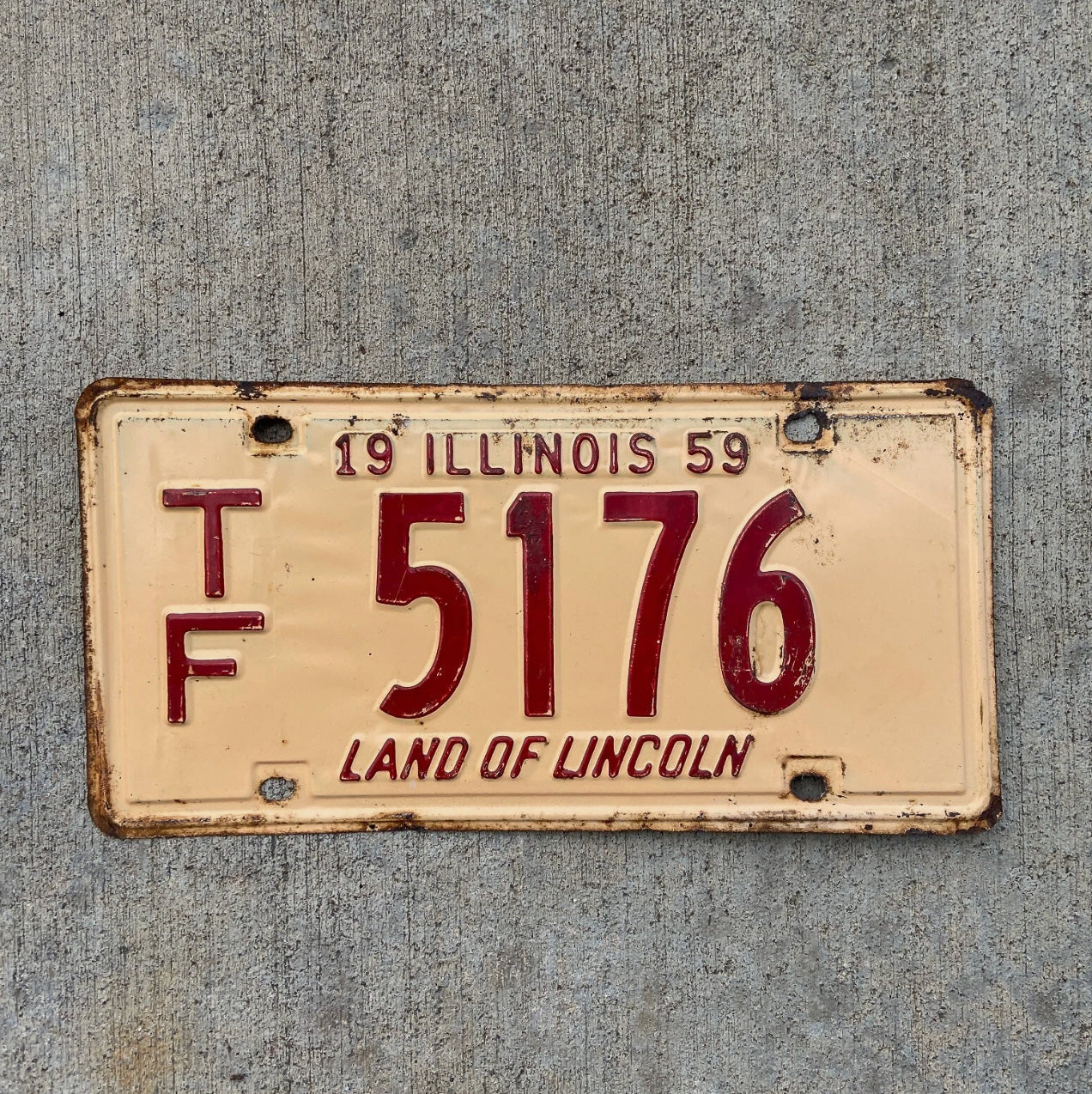 Photo of a 1959 Illinois Truck Mileage Tax License Plate Auto Tag Garage Decor Vintage TF 5176 with original patina