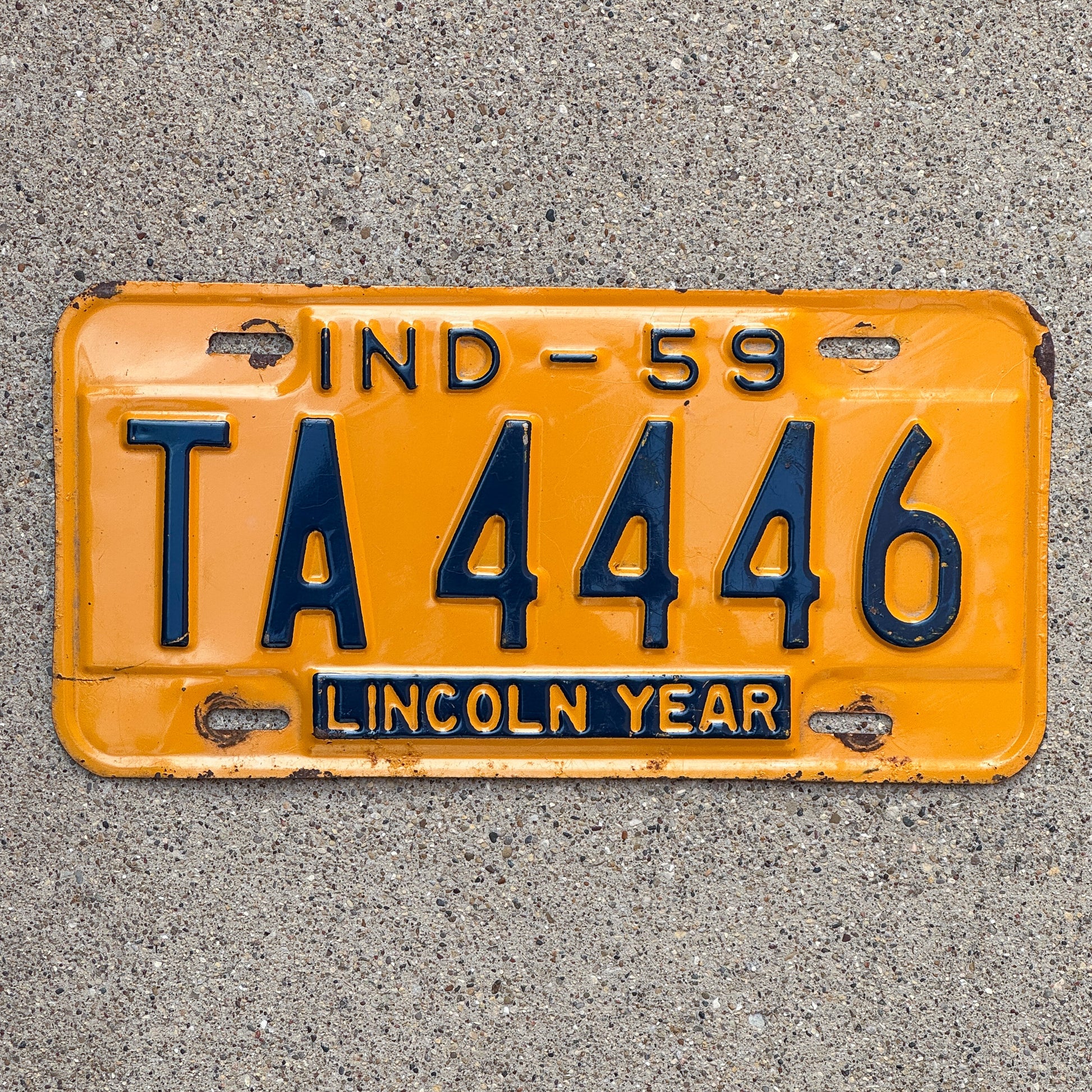 Photo of a 1959 Indiana License Plate Auto Tag Garage Decor Vintage Repeat Repeating TA 4446 with original patina