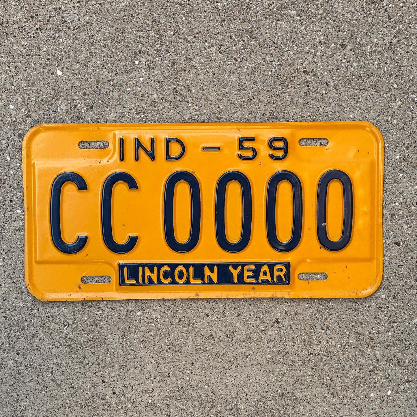 Photo of a 1959 Indiana Sample License Plate Auto Tag Garage Decor Vintage CC0000 with original patina