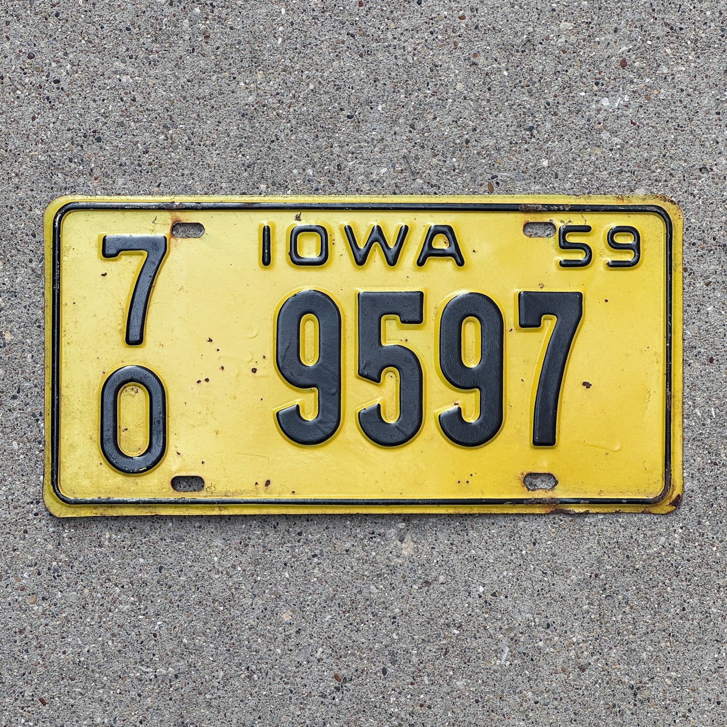 Photo of a 1959 Iowa License Plate Auto Tag Garage Decor Vintage 70 9597 with original patina