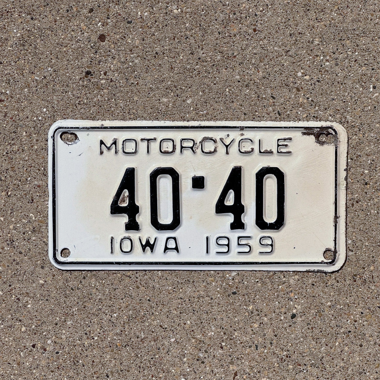 Photo of a 1959 Iowa Motorcycle License Plate Auto Tag Repeat Repeating Hamilton County 40 40 with original patina