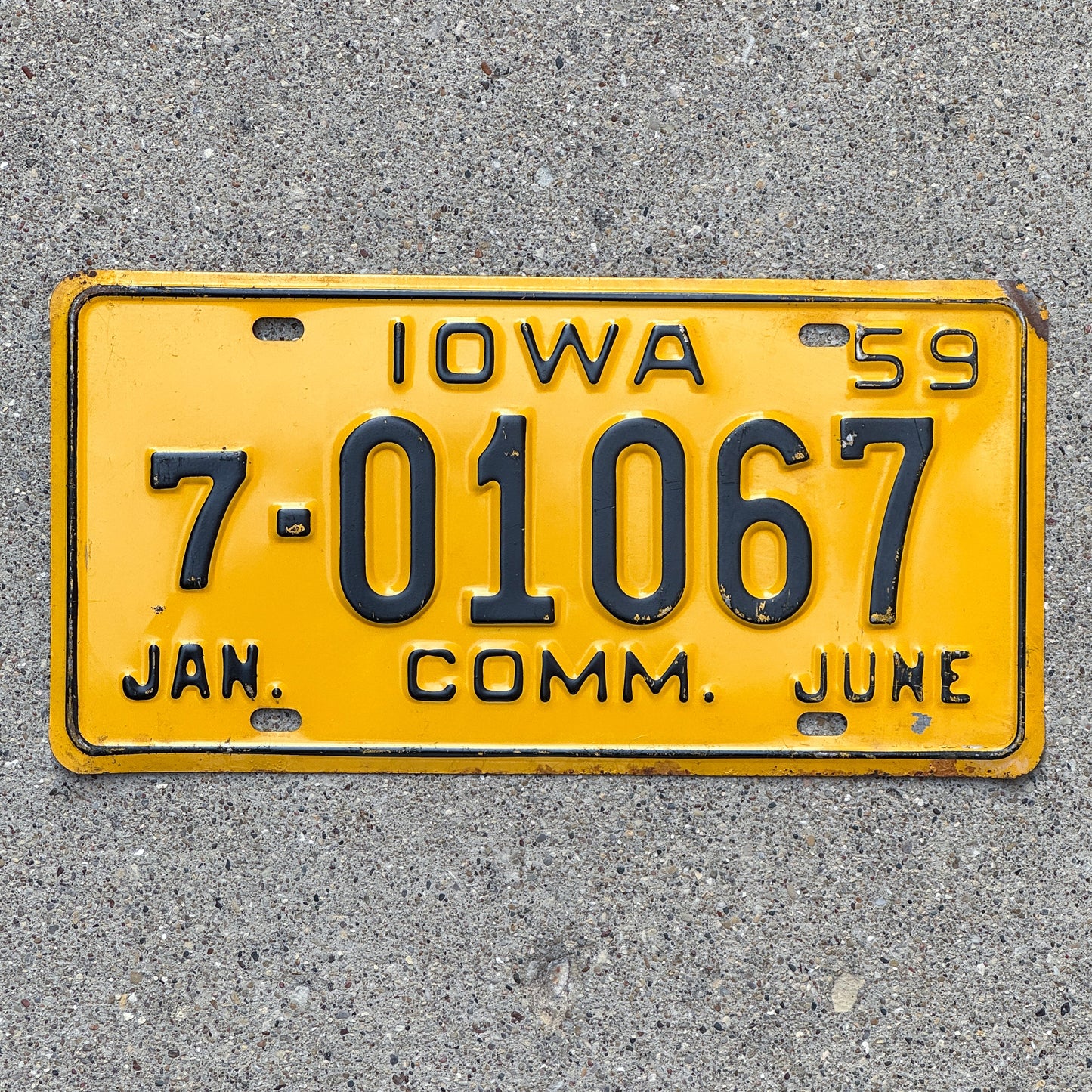 Photo of a 1959 Iowa Truck License Plate Auto Tag Garage Decor Vintage Half Year 7 01067 with original patina