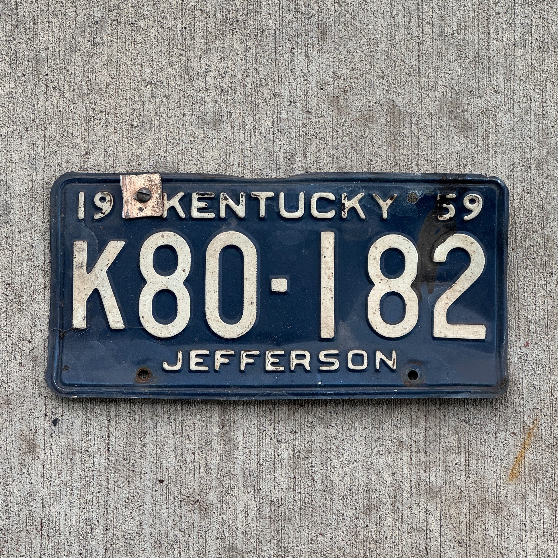 Photo of a 1959 Kentucky License Plate Auto Tag Garage Decor Vintage Jefferson County K80 182 with original patina