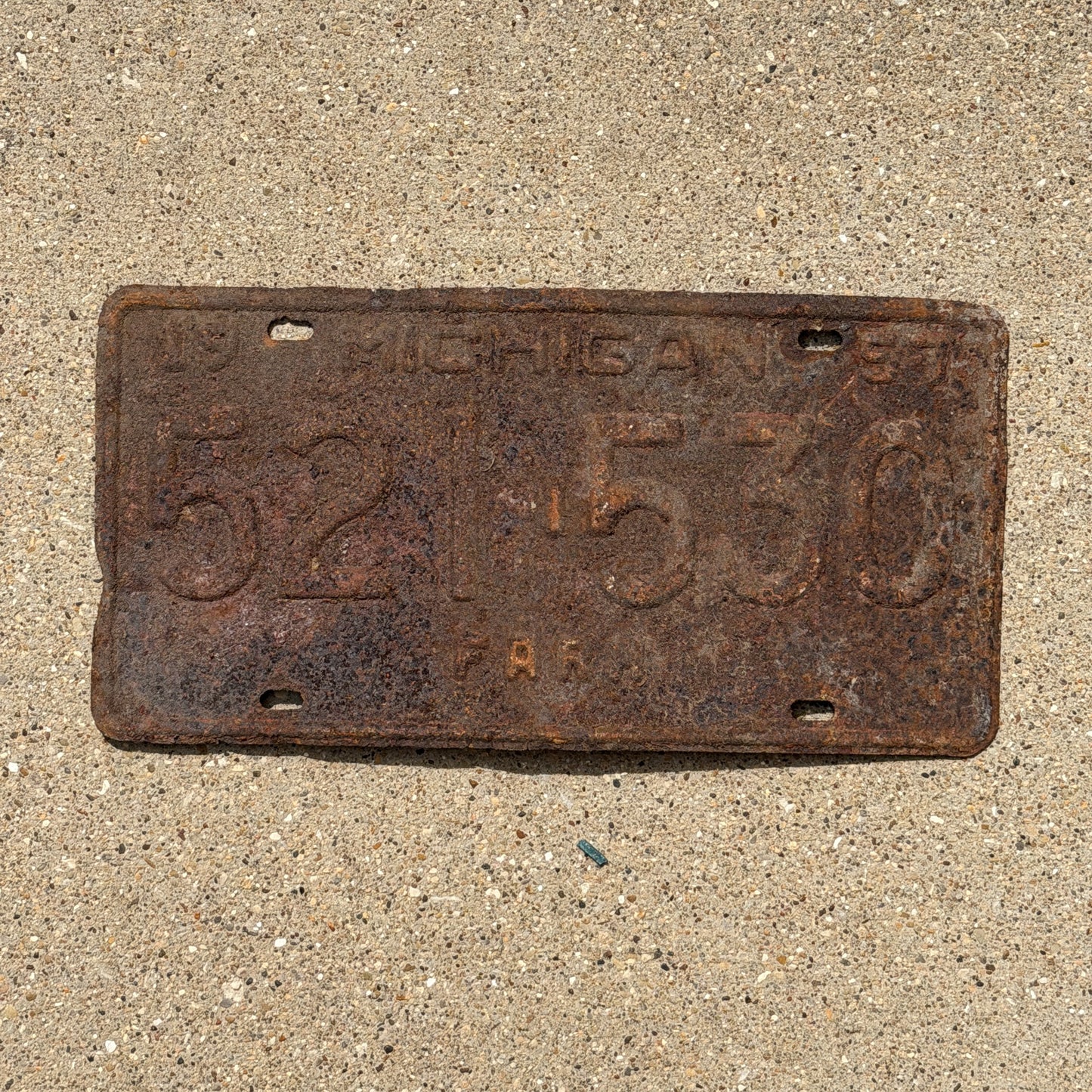 Photo of a 1959 Michigan Farm License Plate Auto Tag Garage Decor Vintage 521 530 with original patina