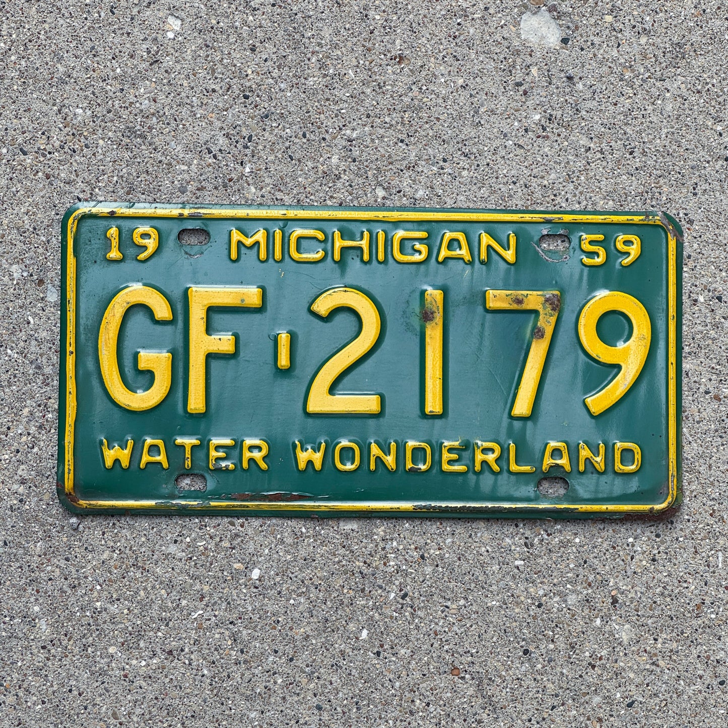 Photo of a 1959 Michigan License Plate Auto Tag Garage Decor Vintage GF 2179 with original patina