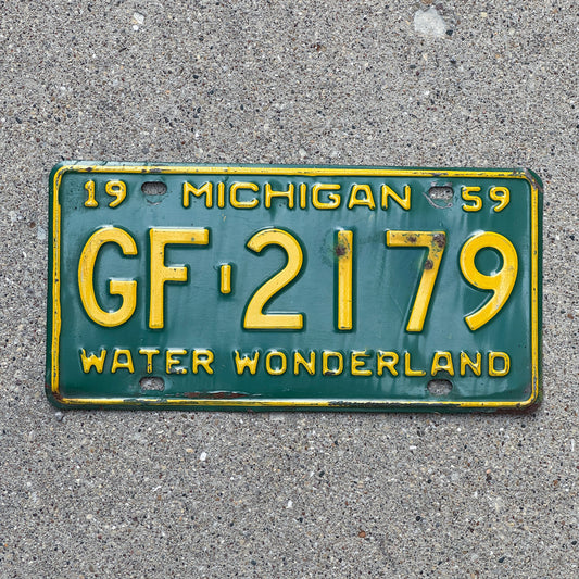 Photo of a 1959 Michigan License Plate Auto Tag Garage Decor Vintage GF 2179 with original patina