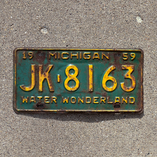Photo of a 1959 Michigan License Plate Auto Tag Garage Decor Vintage JK 8163 with original patina