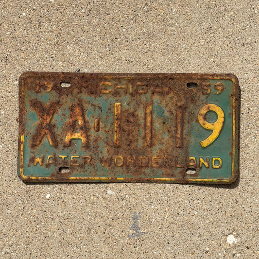 Photo of a 1959 Michigan License Plate Auto Tag Garage Decor Vintage Repeat Repeating XA 1119 with original patina