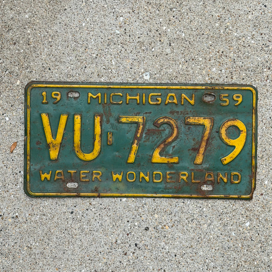 Photo of a 1959 Michigan License Plate Auto Tag Garage Decor Vintage VU 7279 with original patina