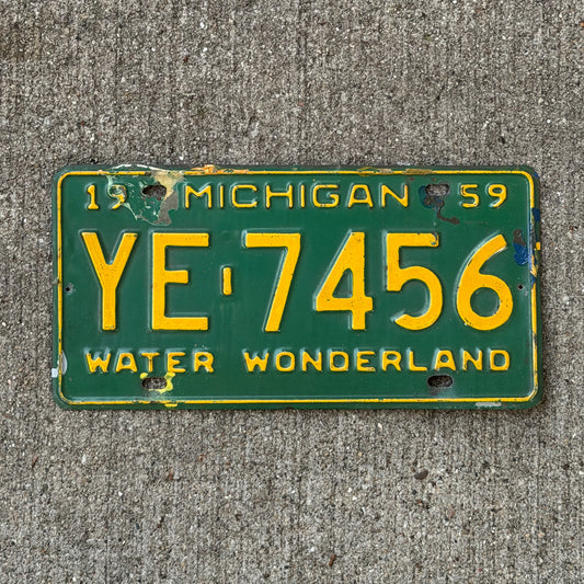 Photo of a 1959 Michigan License Plate Auto Tag Garage Decor Vintage YE 7456 with original patina
