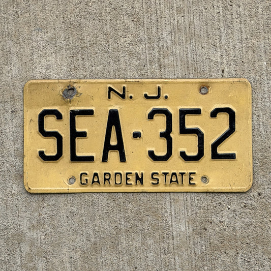 Photo of a 1959 New Jersey License Plate Auto Tag Garage Decor Vintage Beach House Decor SEA 352 with original patina