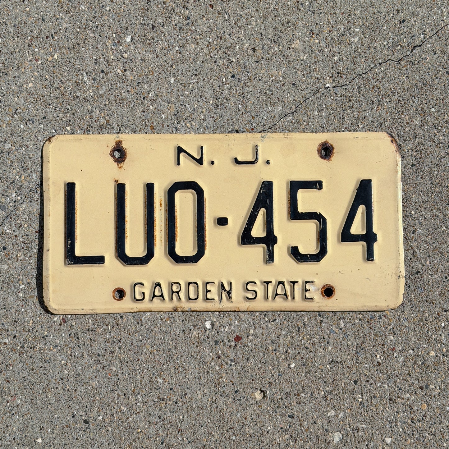Photo of a 1959 New Jersey License Plate Auto Tag Garage Decor Vintage LUO 454 with original patina