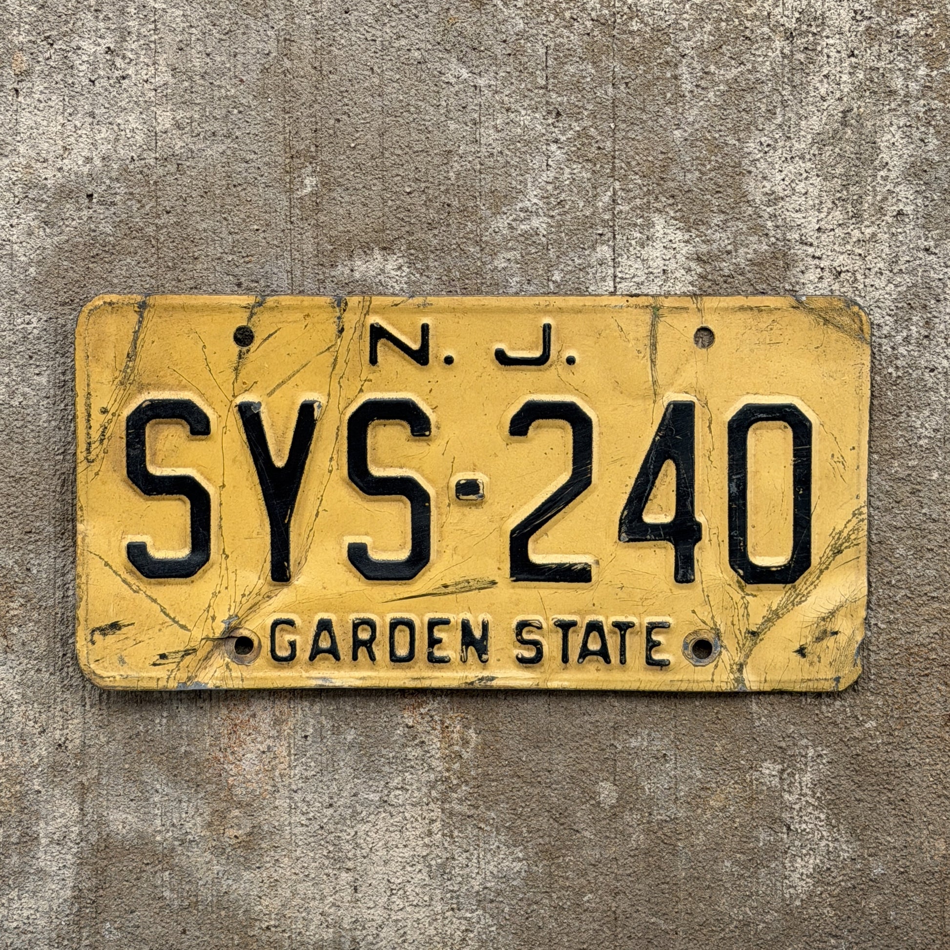Photo of a 1959 New Jersey License Plate Auto Tag Garage Decor Vintage SYS 240 with original patina