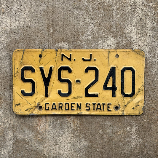 Photo of a 1959 New Jersey License Plate Auto Tag Garage Decor Vintage SYS 240 with original patina