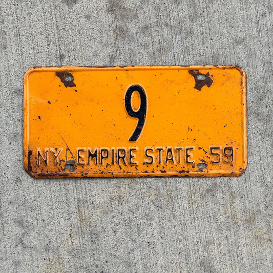 Photo of a 1959 New York Reserved License Plate Auto Tag Garage Decor Vintage Low Number Single Digit 9 with original patina