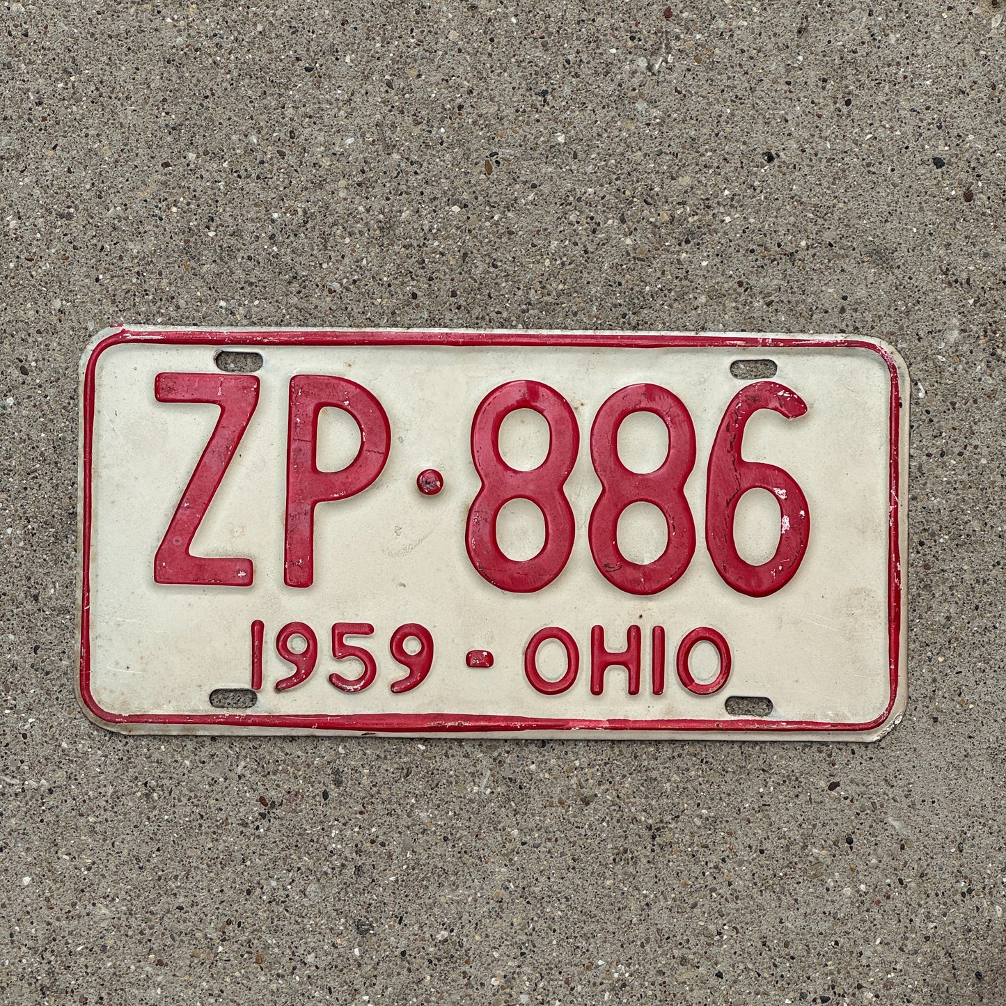Photo of a 1959 Ohio License Plate Auto Tag Garage Decor Vintage ZP 886 with original patina