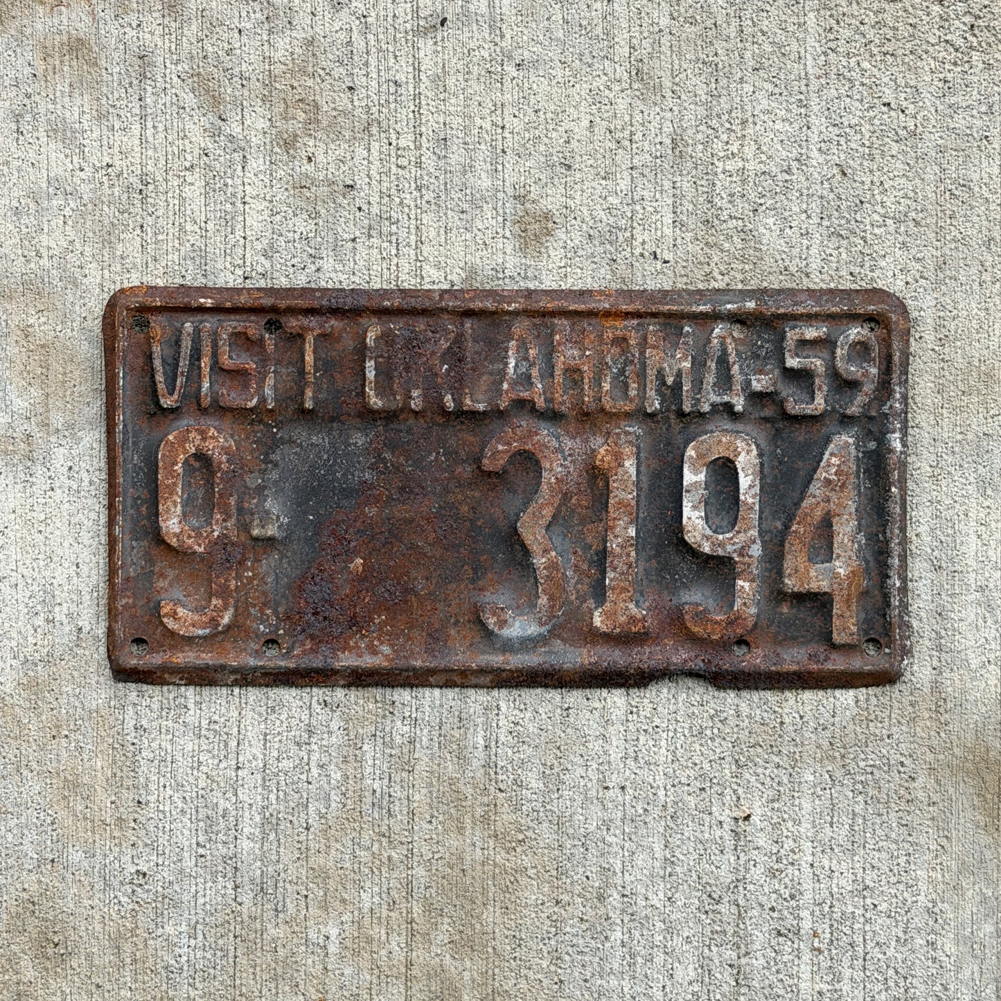 Photo of a 1959 Oklahoma License Plate Auto Tag Garage Decor Vintage 9 3194 with original patina