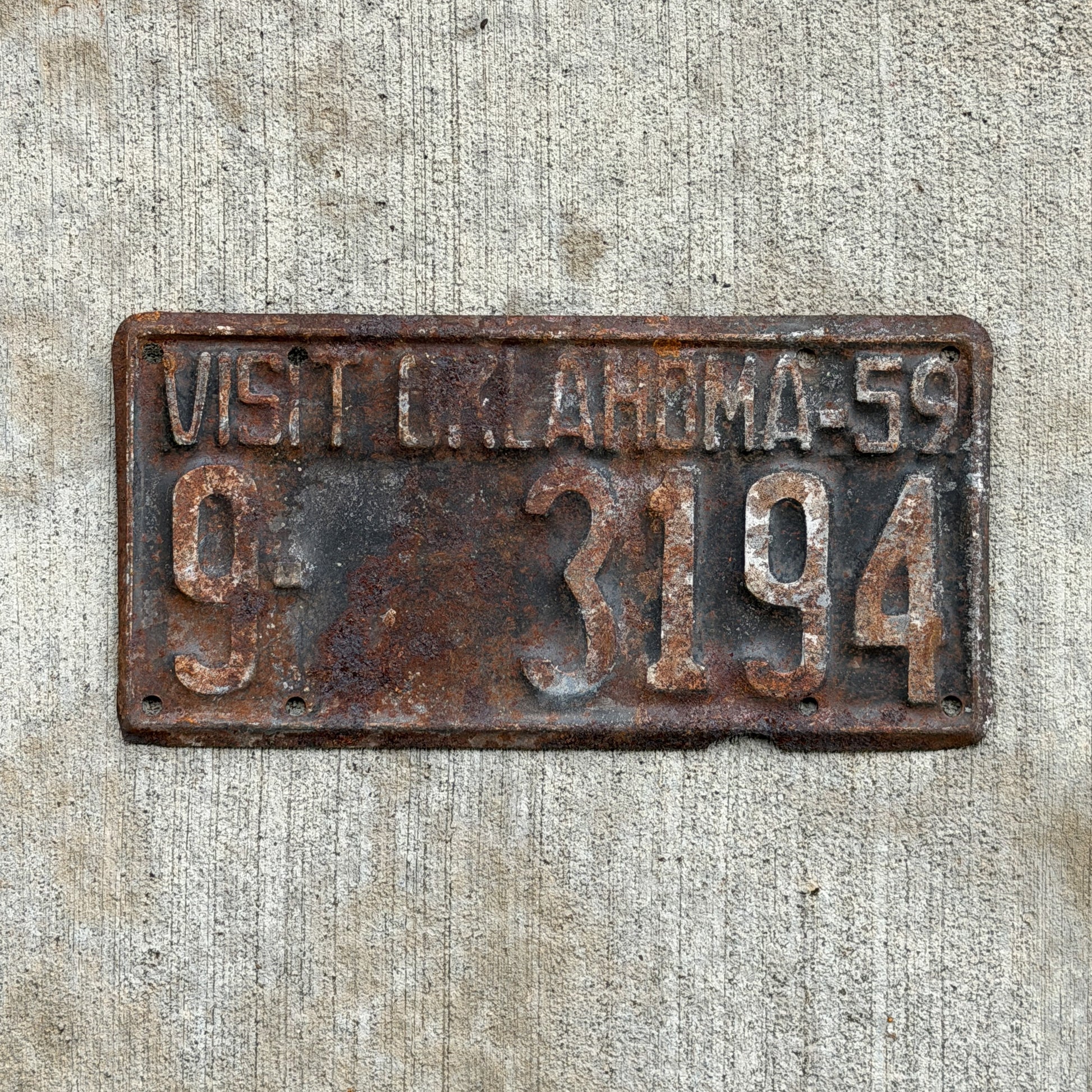 Photo of a 1959 Oklahoma License Plate Auto Tag Garage Decor Vintage 9 3194 with original patina