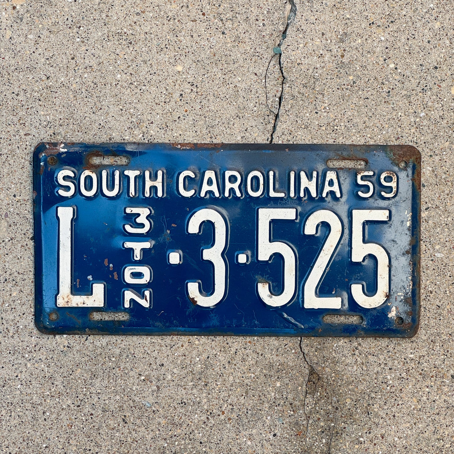 Photo of a 1959 South Carolina Truck License Plate Auto Tag Garage Decor Vintage 3 Ton L 3 525 with original patina