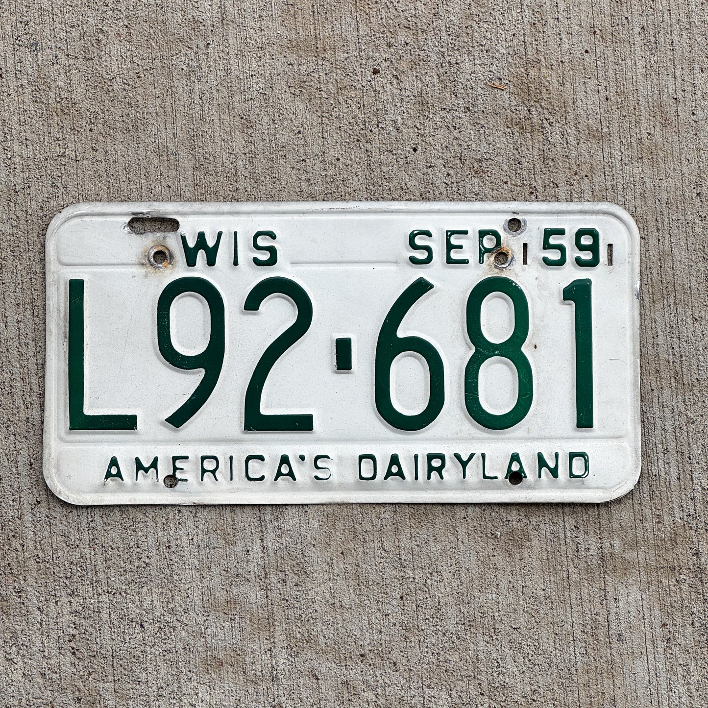 Photo of a 1959 Wisconsin License Plate Auto Tag Garage Decor Vintage L92 681 with original patina