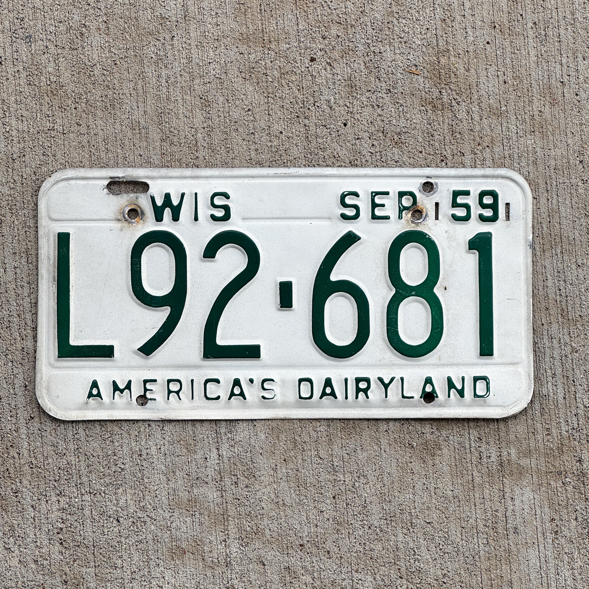 Photo of a 1959 Wisconsin License Plate Auto Tag Garage Decor Vintage L92 681 with original patina