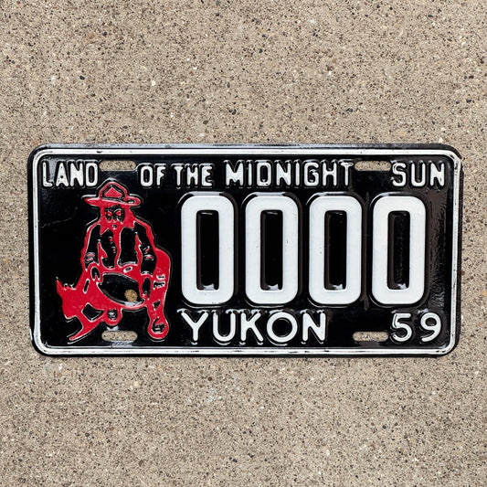 Photo of a 1959 Yukon Sample License Plate Auto Tag Garage Decor Vintage Prospector Gold Miner 0000 with original patina